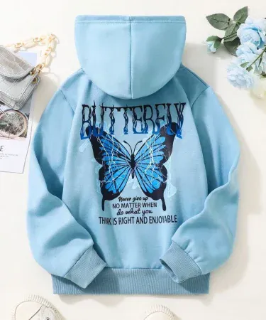 Girl wearing an amazing butterfly printed hoodie with vibrant colors, casual fit and cozy fabric