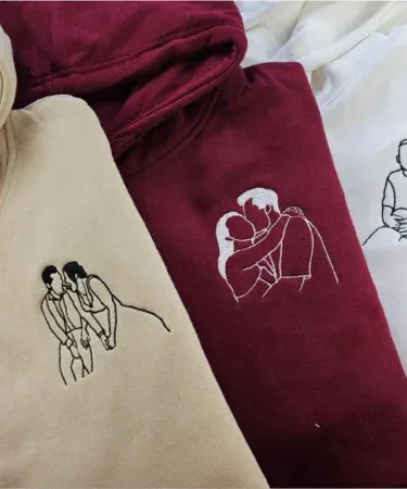 custom couple line art photo print hoodie with I LOVE YOU heart design on sleeve, imagecaption=Personalized couple line‑art hoodie – perfect gift for couples and special occasions.