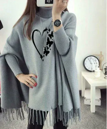 Women’s black polyester ponchu cape shawl with heart and butterfly print, high neckline, and fringe detailing – perfect for stylish layering.