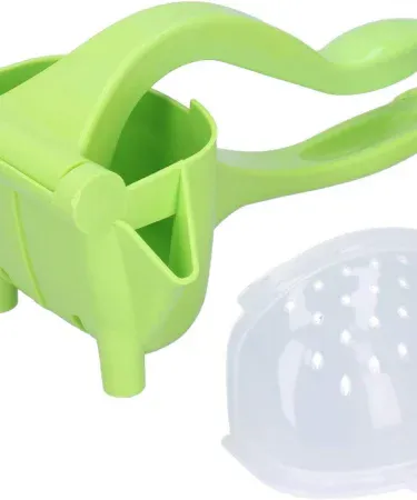 Abu Turab green manual lemon squeezer plastic hand juicer, imagecaption=Abu Turab Manual Lemon Squeezer – versatile plastic hand juicer for fresh fruit juices,