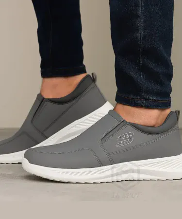 Men’s 2026 premium slip‑on sneakers with black synthetic leather upper and white anti‑slip rubber sole , imagecaption=Premium casual slip‑on sneakers – lightweight comfort for everyday wear ,