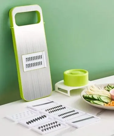 Manual Food Grater 5‑in‑1 stainless steel kitchen slicer for vegetables and fruits, perfect for home cooking in Pakistan, imagecaption=Multi‑functional Manual Food Grater 5‑in‑1 – buy now on Khareedo & Kharedo with Check‑on‑Delivery.