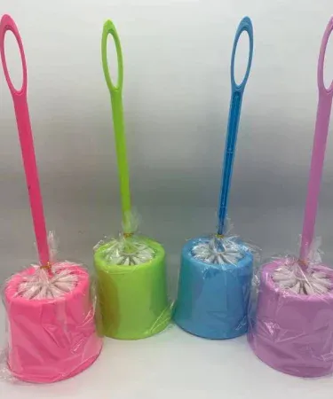 Toilet brush with quick‑dry holder set in vibrant multicolor, pure plastic and silicone bristles, displayed on a bathroom floor.