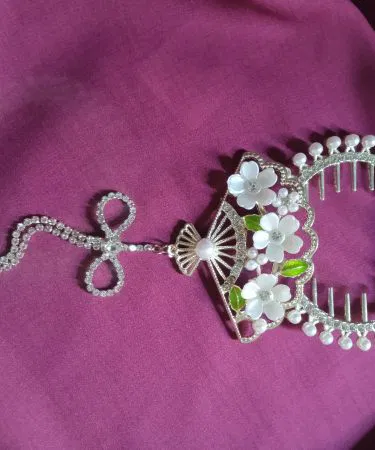Elegant fancy metal hair catcher with intricate design, perfect for stylish looks