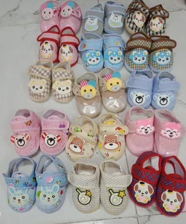China baby shoes newborn to 6 month soft infant footwear, perfect for newborns, free size, displayed on white background