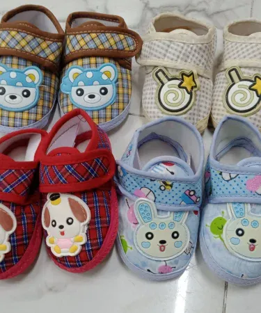 China baby shoes newborn to 6 month soft infant footwear, perfect for newborns, free size, displayed on white background