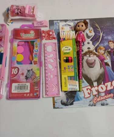 Stationery Combo of 9 items includes pencil box, water‑color set, coloring book, colors, sharpener, eraser, ruler, pencil and stickers , imagecaption=Complete 9‑piece stationery combo perfect for students and artists ,