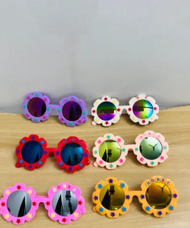 stylish random‑color kids glasses for boys and girls, imagecaption=stylish glasses for kids of all ages in vibrant random colors,