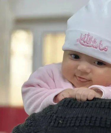 Printed Mashallah baby caps pack of 3 – soft cotton infant hats with vibrant Mashallah print, imagecaption=Adorable printed Mashallah caps (pack of 3) for babies 3‑6 months, available at Khareedo & Kharedo.