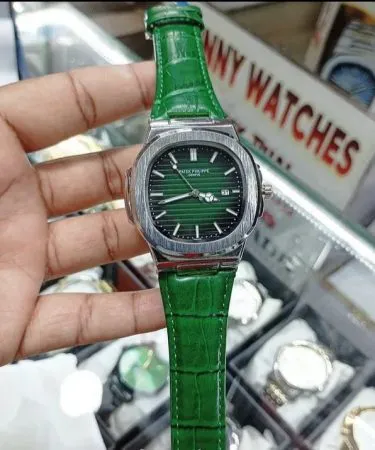 Petek Philip watch butterfly look olive green dial with green alligator leather strap – luxury Nautilus style timepiece