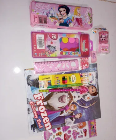 Stationery Combo of 9 items includes pencil box, water‑color set, coloring book, colors, sharpener, eraser, ruler, pencil and stickers , imagecaption=Complete 9‑piece stationery combo perfect for students and artists ,