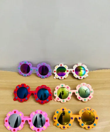 stylish random‑color kids glasses for boys and girls, imagecaption=stylish glasses for kids of all ages in vibrant random colors,