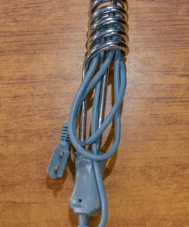 Portable 1500W stainless steel electric water heating rod for quick boiling, imagecaption=Electric immersion water heater rod – perfect for home, office, and outdoor use.