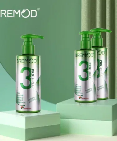 “Bremod Pro Three‑in‑One Hair Serum & Thermal Protect bottle with sleek packaging, showing smooth shiny hair backdrop” , imagecaption=“Bremod Pro 3‑in‑1 Heat Protect Hair Serum – professional formula for smooth, shiny, heat‑protected hair, available on Khareedo & Kharedo” ,