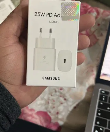 Samsung 25W PD USB‑C Fast Charger – New Box Pack with Free Gift, white charger plugged into a USB‑C device, showing Samsung branding.