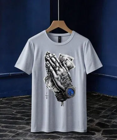 Men gray graphic t‑shirt with prayer hand design on a mannequin, imagecaption=Stylish gray men’s tee featuring a prayer hand graphic,
