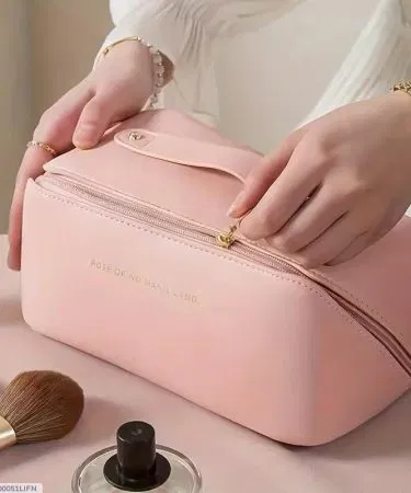 Pink women's synthetic zippered waterproof cosmetic makeup bag sold in Pakistan