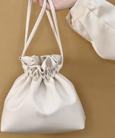 Stylish artificial leather shoulder handbag for women, casual and party use, spacious compartment, strong stitching, smooth zipper