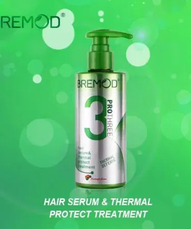 “Bremod Pro Three‑in‑One Hair Serum & Thermal Protect bottle with sleek packaging, showing smooth shiny hair backdrop” , imagecaption=“Bremod Pro 3‑in‑1 Heat Protect Hair Serum – professional formula for smooth, shiny, heat‑protected hair, available on Khareedo & Kharedo” ,