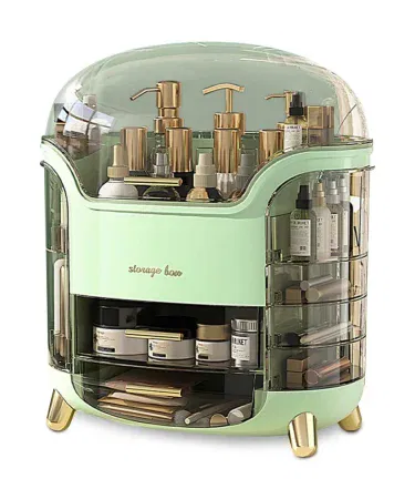 Clear multi‑compartment makeup organizer displaying lipstick, brushes, jewelry and skincare items on a vanity table, imagecaption=Elegant clear makeup organizer for tidy vanity – available on Khareedo | Kharedo.