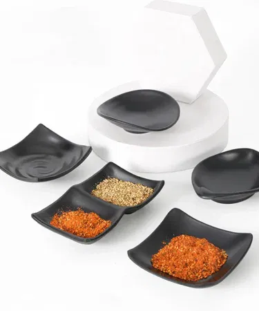 Three compartment plastic dip sauce tray with three sections for sauces, chutney, ketchup, mayo and pickles on a dining table.