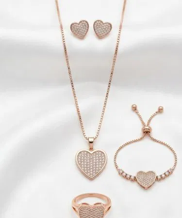 Zarcon 4‑piece combo set with chain, locket, tops and ring in vibrant colors, imagecaption=Elegant Zarcon 4‑piece jewellery combo – perfect for any occasion,