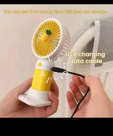 Mini rechargeable USB handheld fan with colorful design and adjustable head, imagecaption=Cute portable mini USB fan – perfect for kids, teens, and on‑the‑go cooling ,