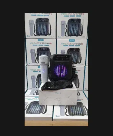 GREETMICE GTS-2005 portable wireless karaoke speaker with microphone, 3‑inch loud sound, USB/TF/Wireless/FM mode, perfect for parties and outdoor events.