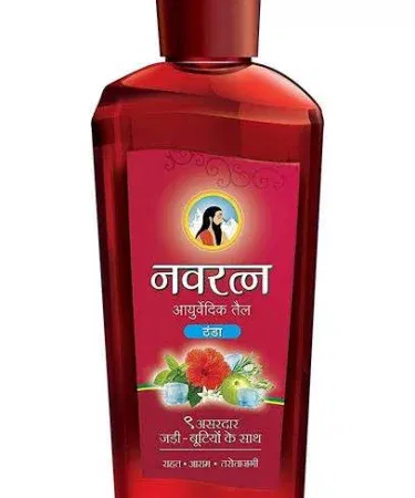 Navratna Ayurvedic Cooling Hair Oil 200ml bottle with herbal ingredients displayed on a wooden surface, imagecaption=Navratna Herbal Oil Cool 200ml – Premium Ayurvedic hair oil for stress relief and cooling effect.