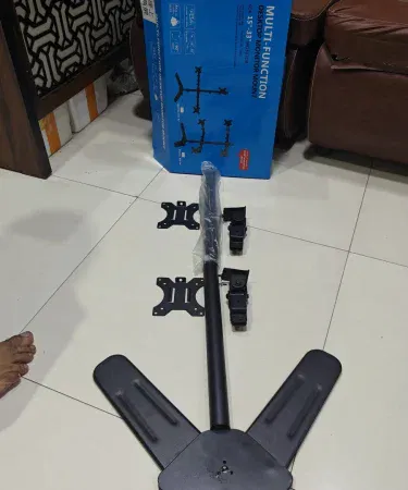 Dual Vertical 15‑34″ Monitor Desk Stand holding two ultrawide screens in a stacked vertical position, black free‑standing LCD mount, perfect for home office and gaming setups, imagecaption=Dual Vertical 15‑34″ Monitor Desk Stand – Space‑saving, ergonomic monitor solution for Pakistani workspaces,