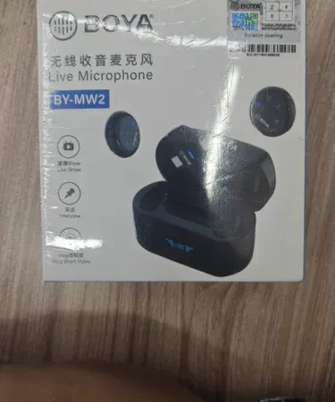 BOYA MW2 Wireless Microphone for Type‑C and iPhone – compact, high‑quality audio device, imagecaption=BOYA MW2 Wireless Microphone compatible with Type‑C Android phones and iPhone devices.