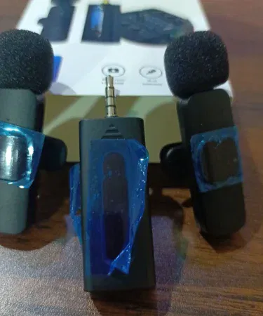 K35 Dual Wireless Dual Mic for Smartphones and Laptops – compact design with dual microphones, Bluetooth connectivity, and noise‑cancellation features,