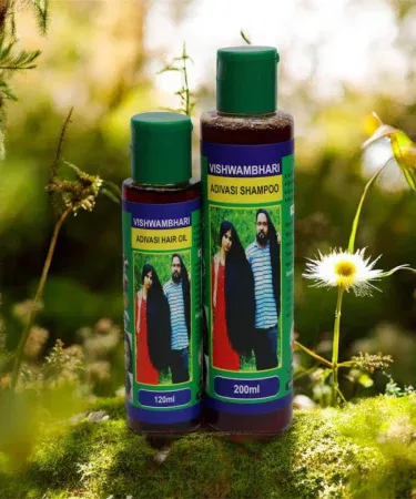 Adivasi Herbal Hair Oil & Shampoo Combo – 120 ml oil and 200 ml shampoo in eco‑friendly packaging, showcasing natural herbal ingredients.