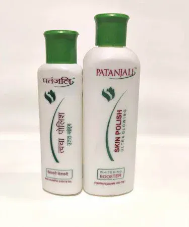 Patna​jali Skin Polish Original – Ultra Glowing Herbal Skin Polish for Men and Women, packaged in a sleek white box with green accents, showing the product label and a radiant skin glow effect.