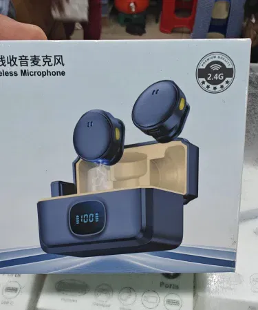 M9 Pro Wireless Microphone – compact noise‑cancelling lapel mic for vlogging and streaming in Pakistan