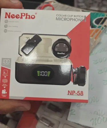 Neepho NP58 Wireless Microphone – compact portable mic with sleek black design, showing the microphone and its receiver unit on a studio desk.