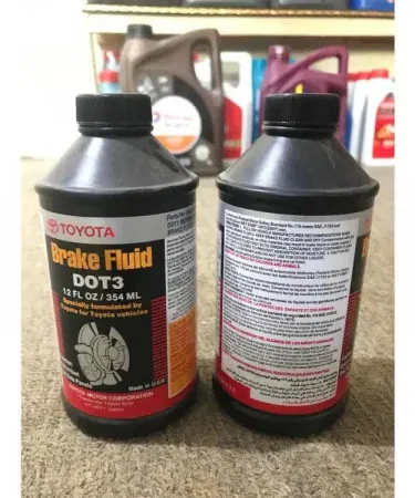 Toyota Genuine Brake Fluid DOT 3 – 354 ML bottle with Toyota logo, high‑performance brake fluid for cars in Pakistan