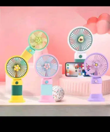 Mini rechargeable USB handheld fan with colorful design and adjustable head, imagecaption=Cute portable mini USB fan – perfect for kids, teens, and on‑the‑go cooling ,