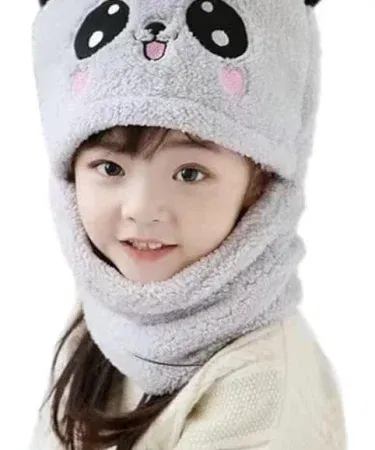 Cute baby wearing a soft knitted panda cap with playful panda ears, perfect for winter outings.
