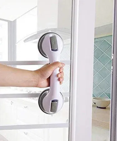 Helping Handle for Bathroom Safety strong suction cup grab bar installed on smooth bathroom tiles, imagecaption=Strong suction cup grab bar – portable, no‑drill safety rail for showers and bathtubs.