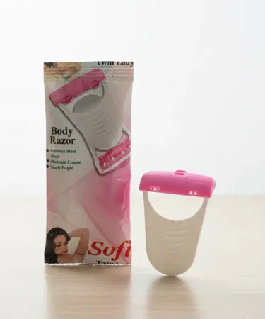 Platinum‑coated stainless steel single‑edge body razor for smooth, irritation‑free hair removal