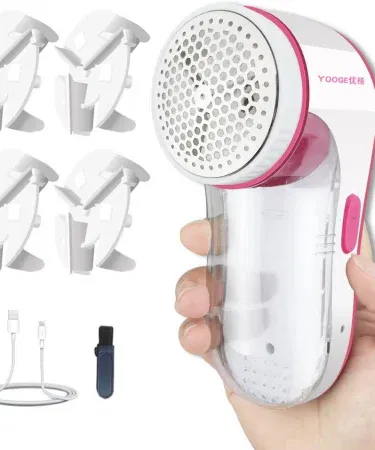 Electric lint remover fabric shaver with ergonomic handle and large shaving head for clothes, upholstery and linens , imagecaption=Portable cordless electric lint remover – perfect for quick de‑pilling at home or on the go ,