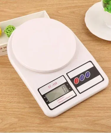 Electronic digital kitchen weight scale with LCD display, stainless steel platform, 5 kg capacity, imagecaption=Premium digital kitchen scale – precise measurements for cooking and baking,