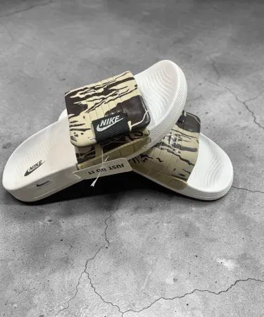 Nike Slides – Soft & Comfortable Everyday Wear – Black color, cushioned footbed, anti‑slip sole – Khareedo Kharedo