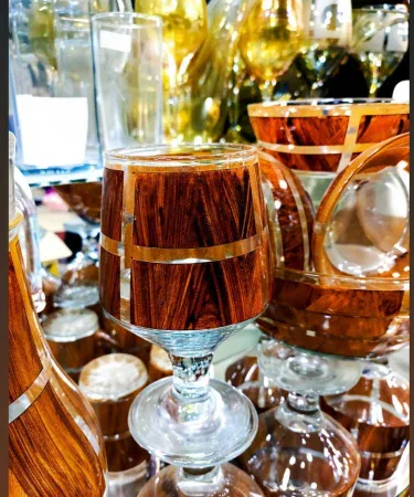 Elegant wooden texture 20 piece glass water set with gold trim sold in Pakistan