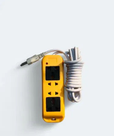Power extension outlet with four sockets and three meter long copper wire sold in Pakistan