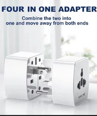 Universal travel adapter with UK EU US AU plugs and dual sockets sold in Pakistan