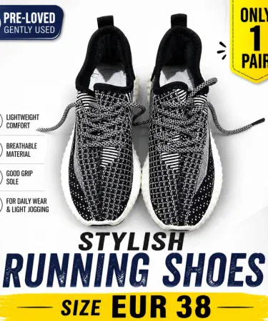 Black and white pre loved running shoes size EUR 38 for women sold in Pakistan