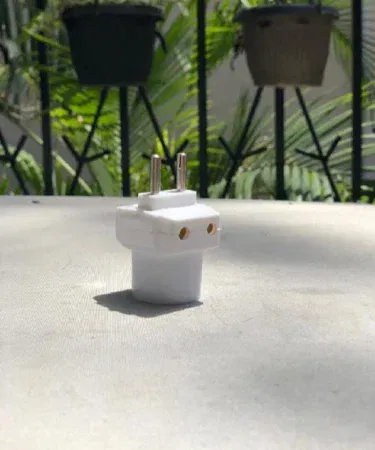 Two pin multi adapter socket holder with bulb and dual side options in Pakistan