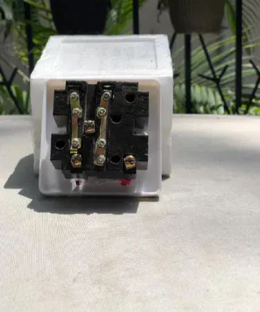 Universal 9-in-1 power plug adapter with multiple fittings sold in Pakistan